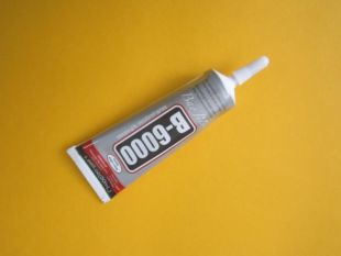 Клей силіконовий Zhanlida B6000 прозорий (50мл, тюбик з дозатором) (M)